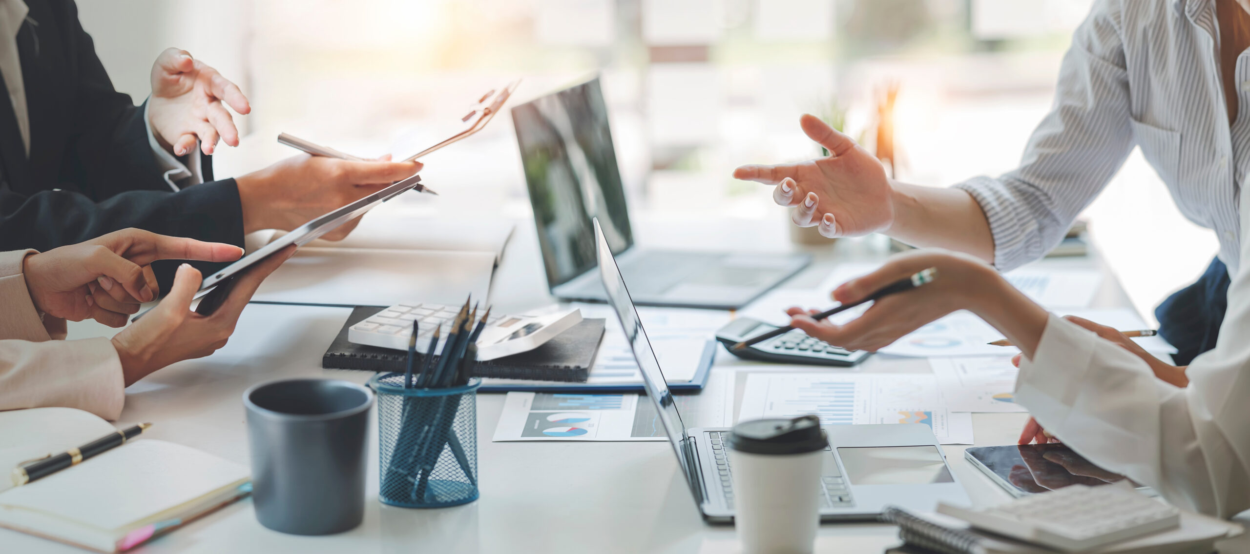 diverse coworkers working together in boardroom, brainstorming,